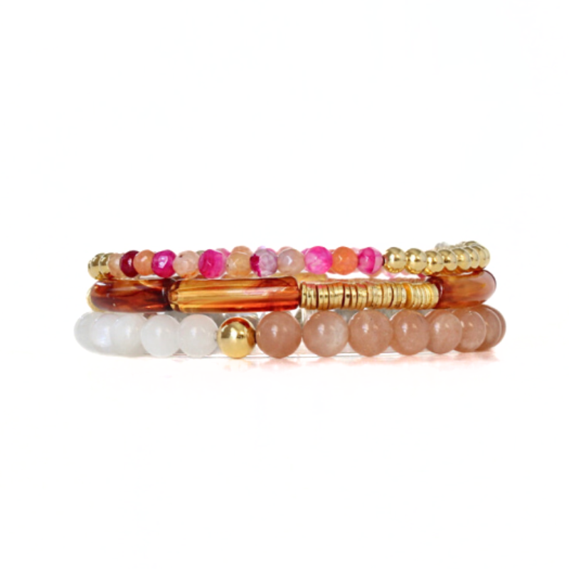 3-pece bracelet stack designed with chakra, moonstone and sunstone healing beads. Also designed with a dainty brown marble skinny acrylic bangle and a dainty gold-filled beaded bracelet with coral and magenta faceted agate beads.