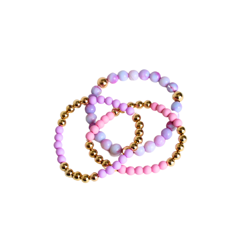Purple marble opal gemstone beaded bracelet with 18k gold filled beads. This stretch bracelet has a feminine look.