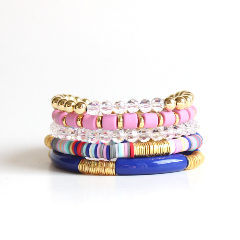 Blue rainbow polmyer clay beaded bracelet is designed with gold flat beads. This fun bead bracelet is perfect to wear alone or to any Elliot Lane bracelet. This stretch bracelet is made with premium elastic string and will last for years to come.