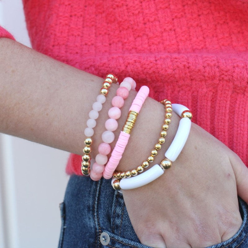 5-peice pink and gold beaded bracelet set.  This bracelet has pink and acrylic beaded bracelets with gold-filled beads.  Pink polymer clay beaded bracelet adds a feminine touch