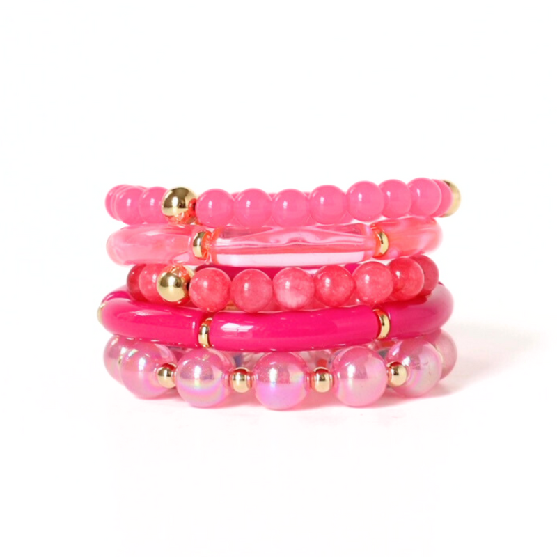 5-piece barbie pink chunky beaded bracelet stack. Designed with pink acrylic bangles, 12mm pink iridescent beads, and gold filled round beads.