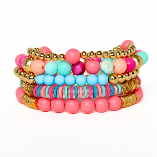 Bright pink and blue beaded stretch bracelet set.  This set features pink and blue acrylic beads and gold beads.