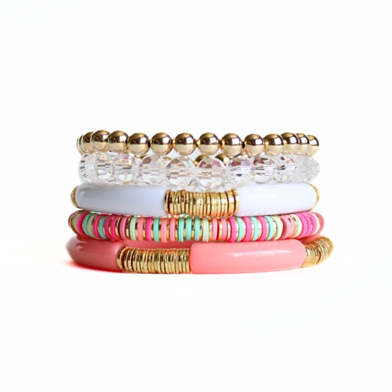 5-piece peach and white acrylic and polymer bead bracelet stack. This bracelet stack is also designed with clear glass beads and gold-filled round beads