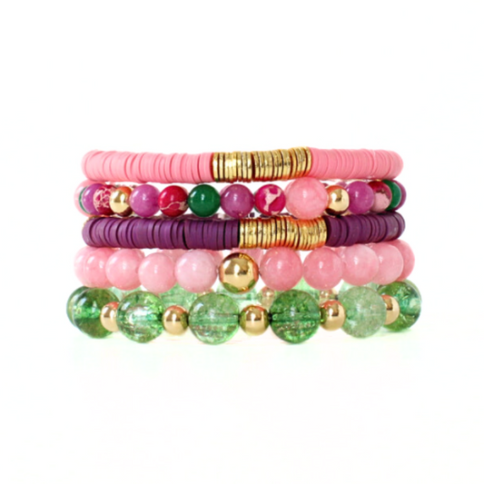 Pink, purple and green 5-piece bracelet stack. This stack is designed with polymer clay beads with gold-plated flats. Natural pink and white jade beads are adorned with gold-filed round beads complete this simple bracelet. The 12 mm gold round acrylic bead adds a modern touch to this gorgeous stack