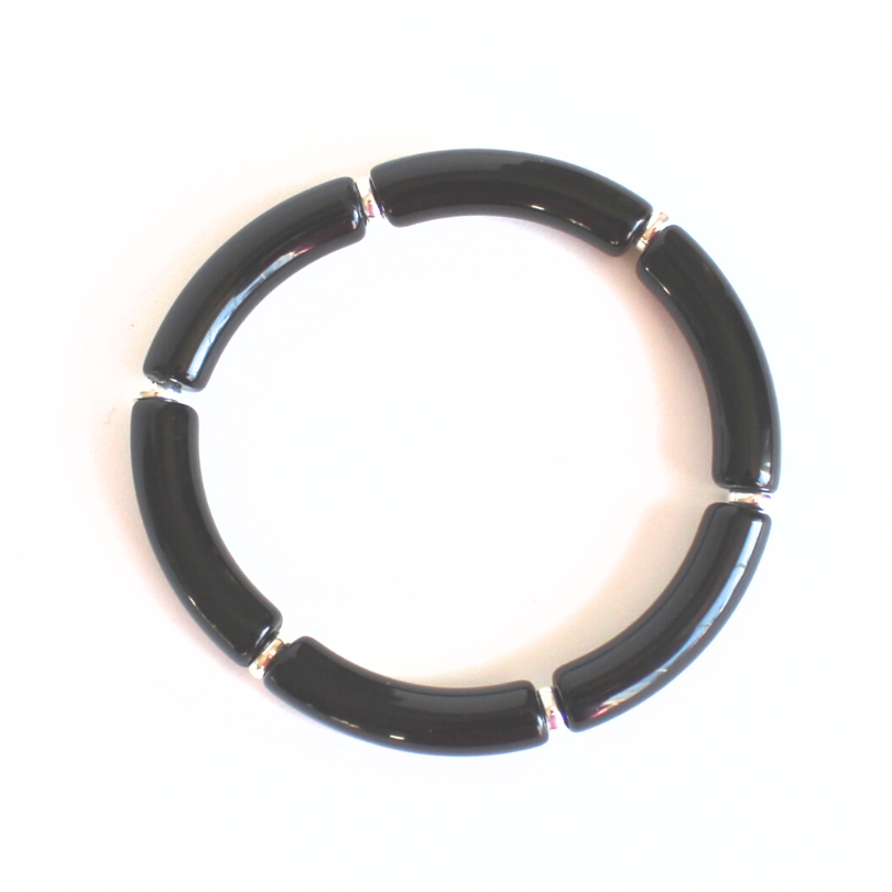 Black acrylic bangle with silver beads. This lightweight bangle is versatile and will go with any bracelet in your jewelry box.
