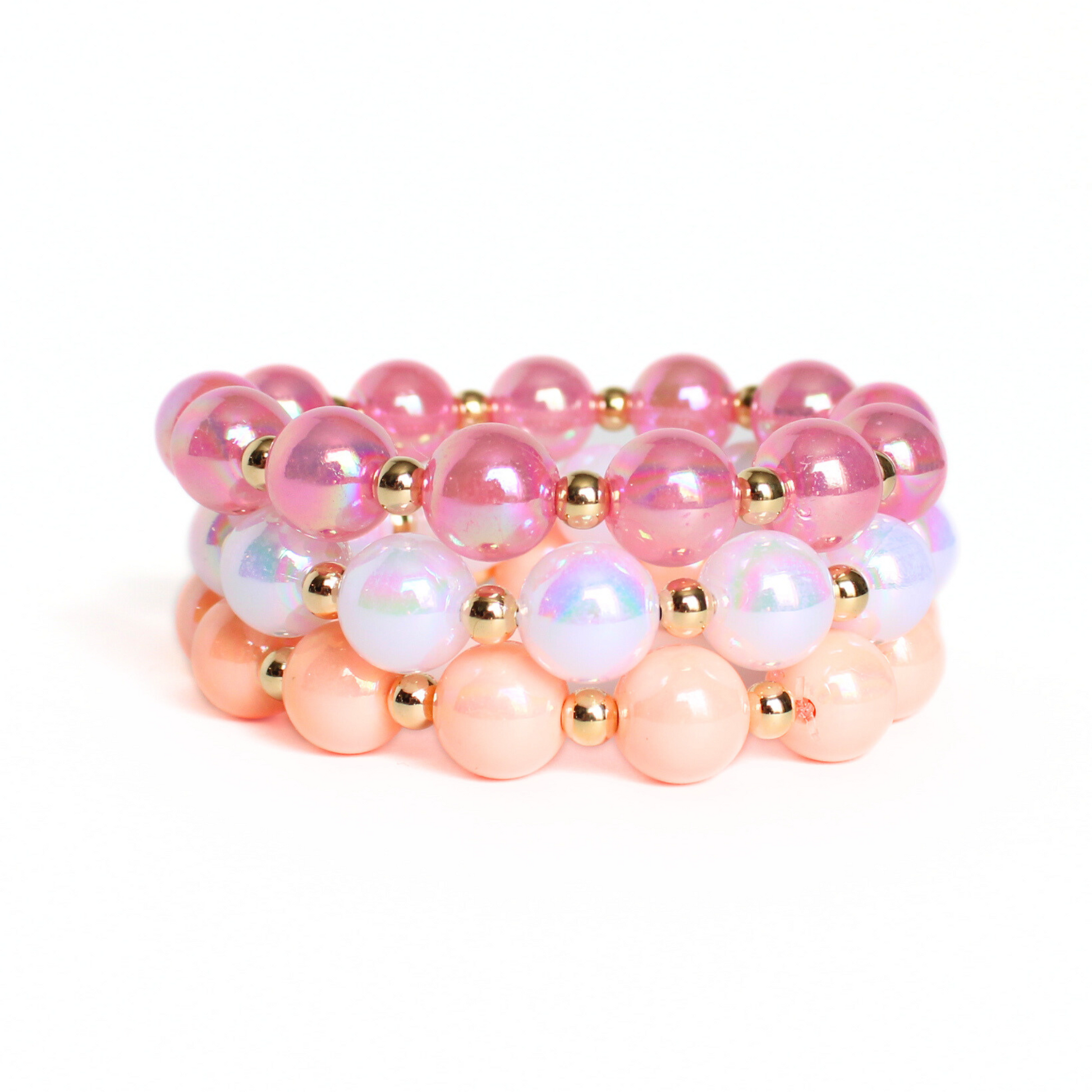 3-piece chunky acrylic beaded bracelet set. Designed with 12mm pink, white and peach iridescent acrylic beads. Between each acrylic bead is a 5mm 18k gold filled round bead