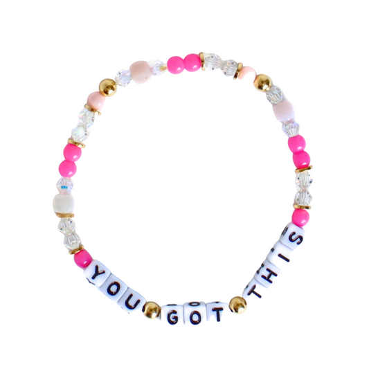 pink beaded breast cancer awareness bracelet. Designed with crystal beads, pink opal beads and pink seed beads.