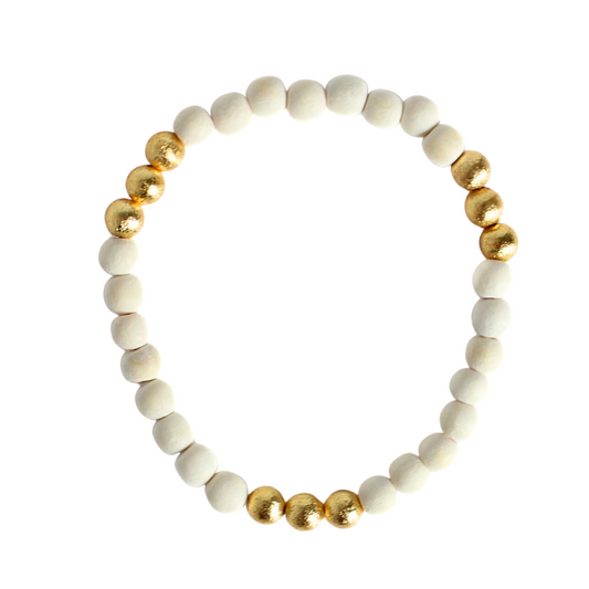 White wooden beaded bracelet is stretchy making it easy to wear. This bracelet gives a tropical vibe for all your beach looks.