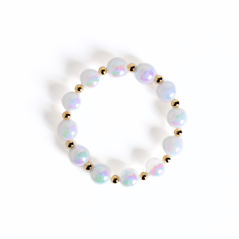 12mm large white iridescent acrylic stretch beaded bracelet with 5mm 18k gold filled round beads alternating with each white bead.