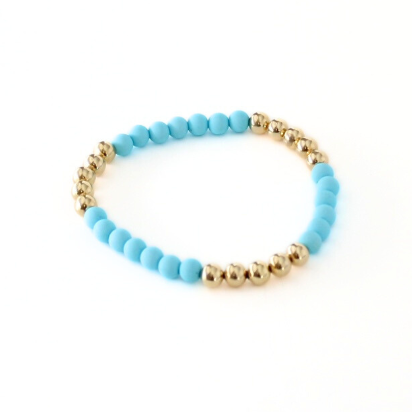 Blue acrylic and gold beaded stretch bracelet