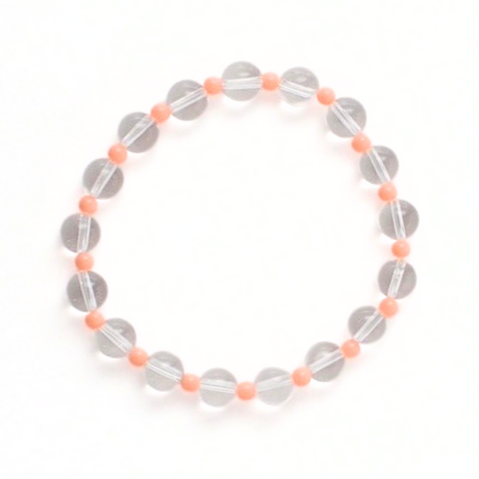 Clear quartz beaded bracelet with peach seed beads. Perfect Christmas gift for her.