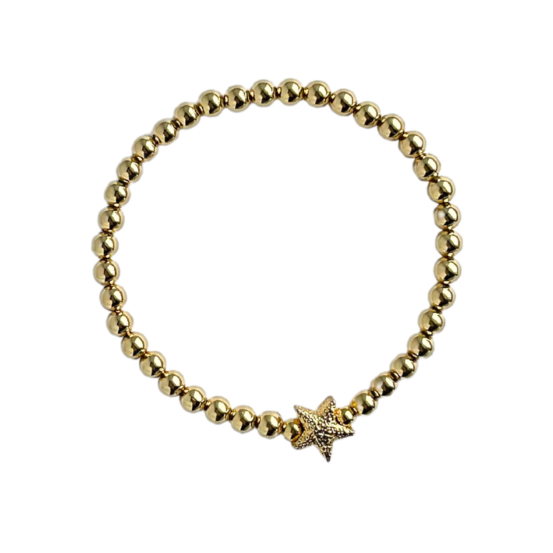 Dainty gold filled beaded stretch bracelet with gold plated forte star charm