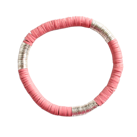 Single beaded neutral stretch bracelet for layering and stacking. Curated with pink mauve polymer clay beads and silver-plated flat beads, this classic bracelet will add a timeless look to any outfit or bracelet stack. Wear alone or add to any bracelet to create the perfect look.