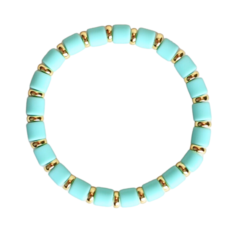 Single beaded bright and bold stretch bracelet for layering and stacking. Curated with mint green polymer clay wide beads and gold-plated flat beads, this playful bracelet will add a pop of color to any outfit or bracelet stack. Wear alone or add to any bracelet to create the perfect look.
