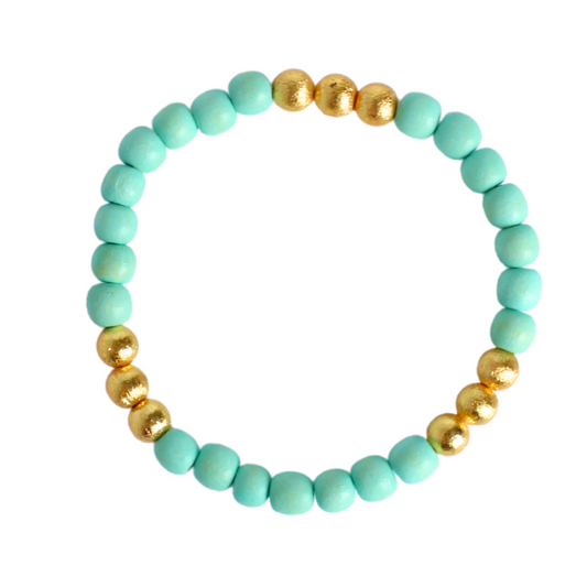 Lightweight mint wood beaded stretch bracelet. Accented with brushed gold beads.
