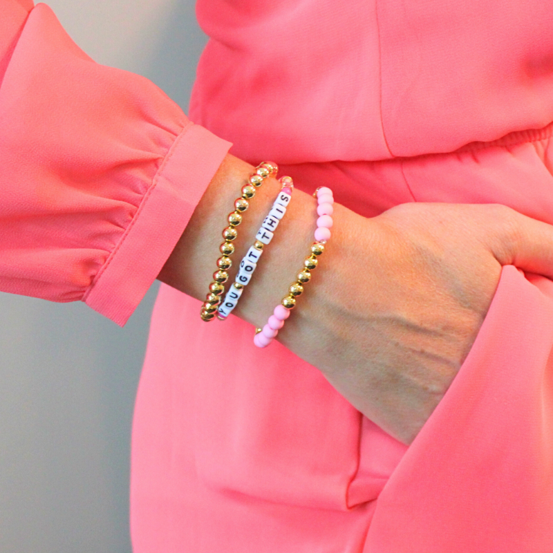pink beaded breast cancer awareness bracelet. Designed with crystal beads, pink opal beads and pink seed beads.