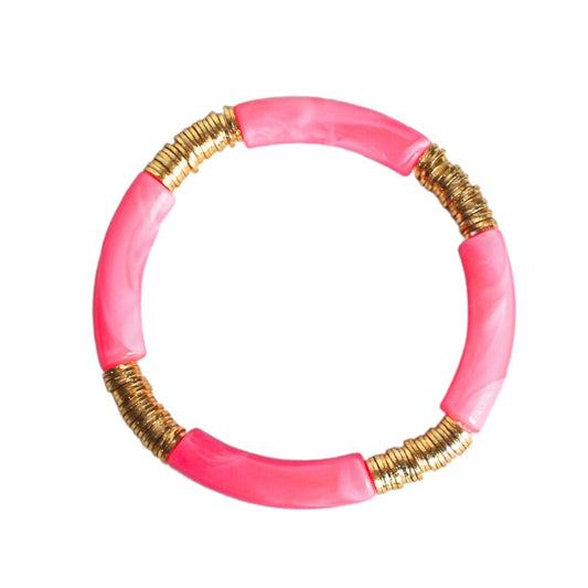 Pink marble acrylic bangle with gold flat beads. This lightweight bangle will add the perfect pop of color to your oufit!!