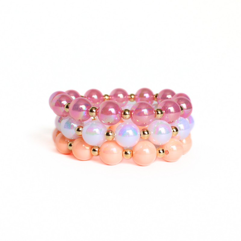 3-piece chunky acrylic beaded bracelet set. Designed with 12mm pink, white and peach iridescent acrylic beads. Between each acrylic bead is a 5mm 18k gold filled round beads.