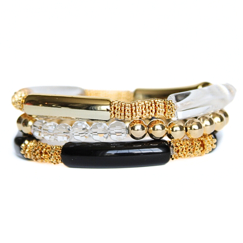 3-piece black beaded stretch bracelet set. This classic bracelet stack is designed 18k gold filled beads and clear and black acrylic bangles. This stack is perfect for that night out with the girls or that special someone. Dress up any dress or pant suit with this classic black statement piece.