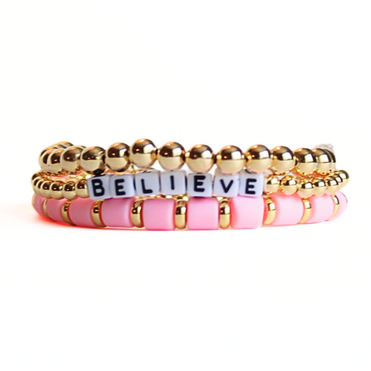 3-piece pink and gold bracelet stack. Pink wide polymer clay beads and gold-filled beads are designed with customizable letter beads.