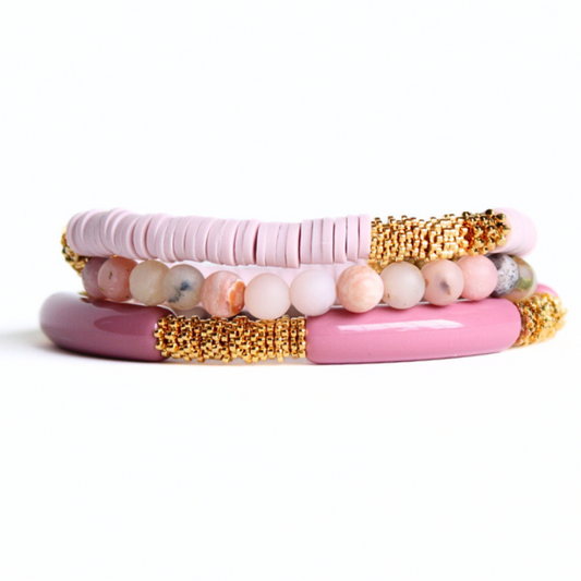 3-piece pink opal gemstone beaded bracelet. With warm pink acrylic bangles and pink polymer clay beads, this bracelet set has a modern feminine look.