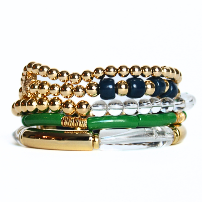 5-Piece 18k gold beaded stretch bracelet with clear round natural Brazilian quartz gemstones. 2 bracelets have green, clear and gold acrylic bangles. This set is also designed with ocean blue forte gemstone beads.