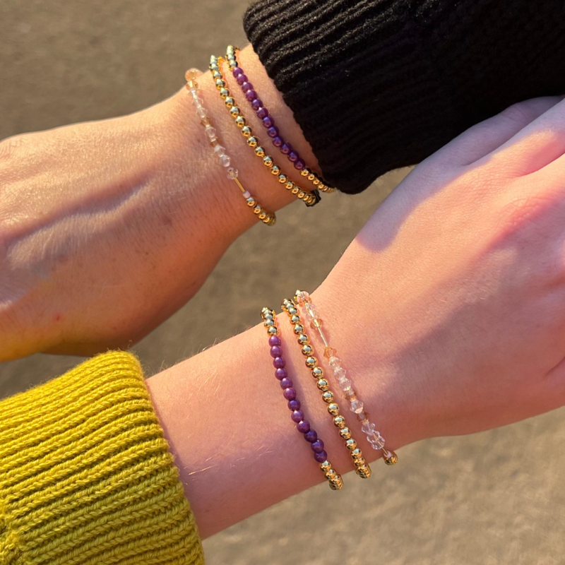 Purple beaded friendship bracelet set for women. 18K gold filled beaded bracelets with purple glass and clear crystal beads. Waterproof and tarnish resistant.