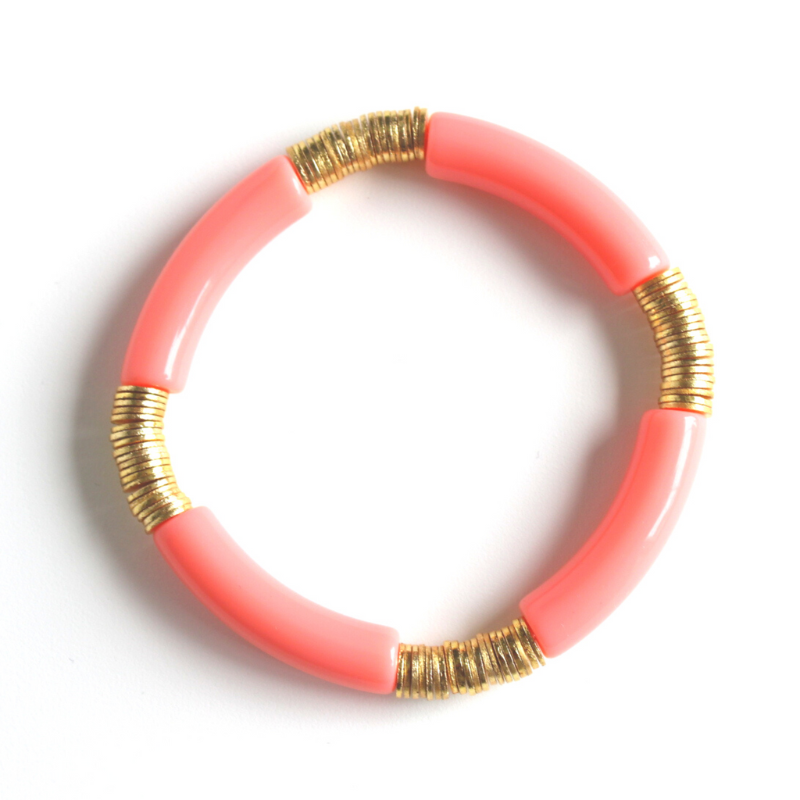 Orange acrylic bangle with gold flat beads. Modern bangle that is bright, light and fun.