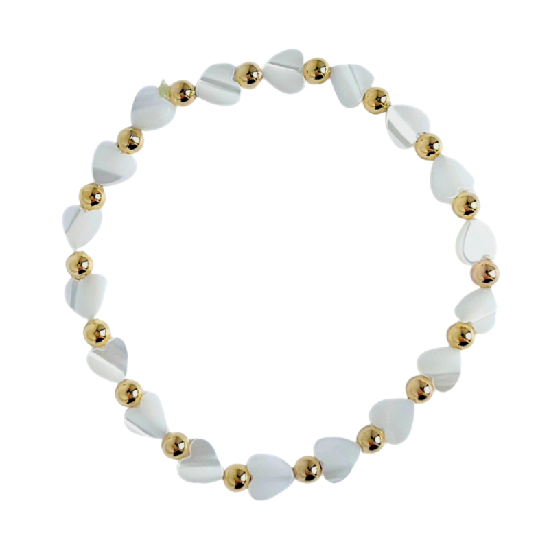 Dainty mother of pearl heart charm bracelet with 18k gold filled round beads. Bracelet's design is one mother of pearl heart charm followed by a gold bead.