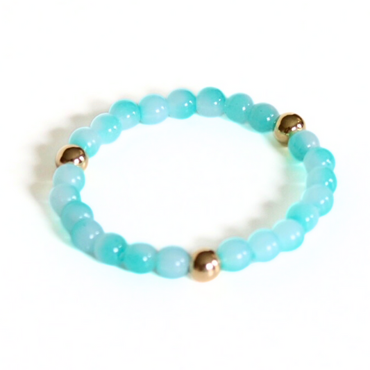 Ocean blue acrylic beaded bracelet with gold filled beads