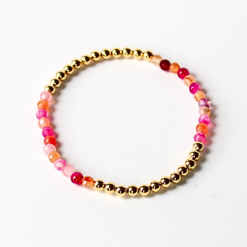 Pink and gold beaded stretch bracelet