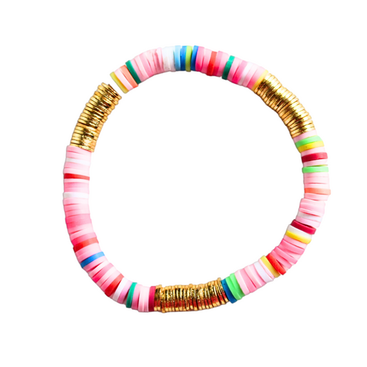 Pink rainbow polmyer clay beaded bracelet is designed with gold flat beads. This fun bead bracelet is perfect to wear alone or to any Elliot Lane bracelet. This stretch bracelet is made with premium elastic string and will last for years to come.