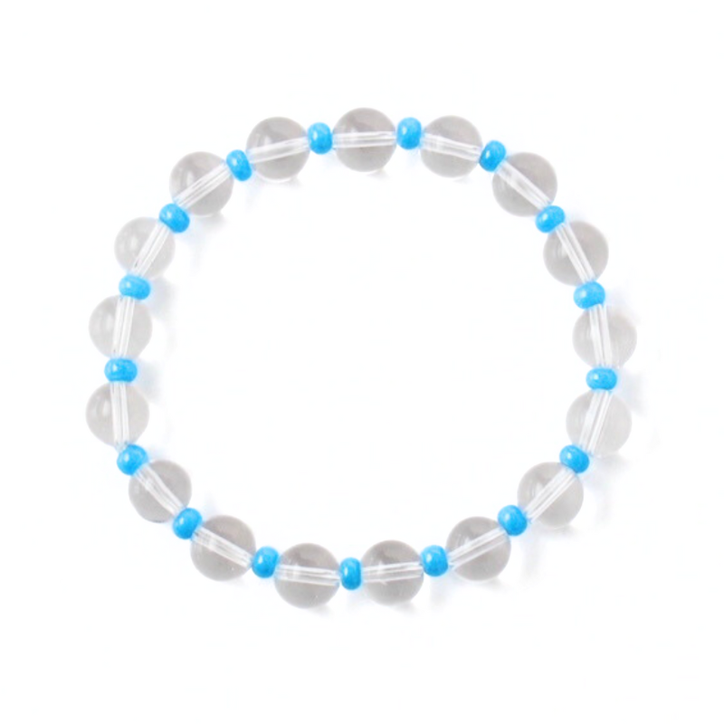 Clear translucent quartz beaded bracelet designed with dainty blue seed beads