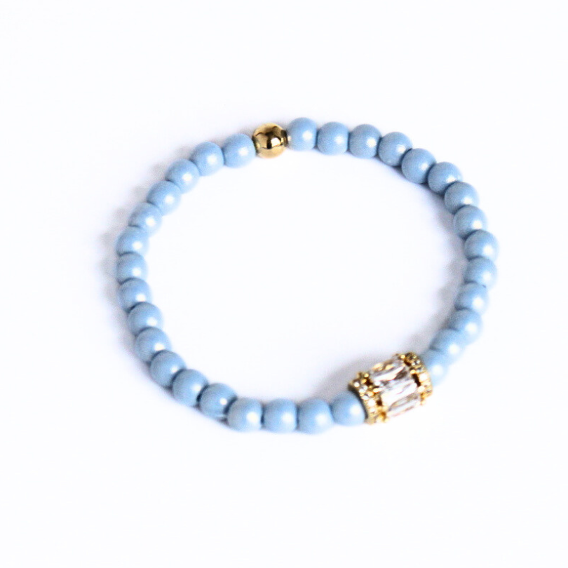 Blue shell pearl bracelet with gold crystal bead.