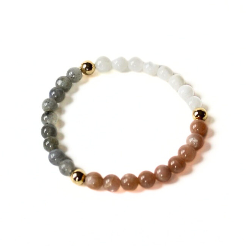 Healing stone beaded stretch bracelet designed with chakra, moonstone and sunstone beads. This bracelet is accented with gold-filled round beads.