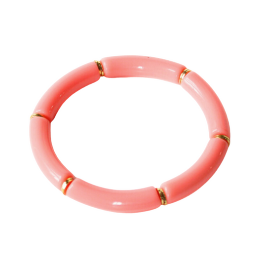 Pink coral acrylic tube bangle bracelet with wide flat beads.
