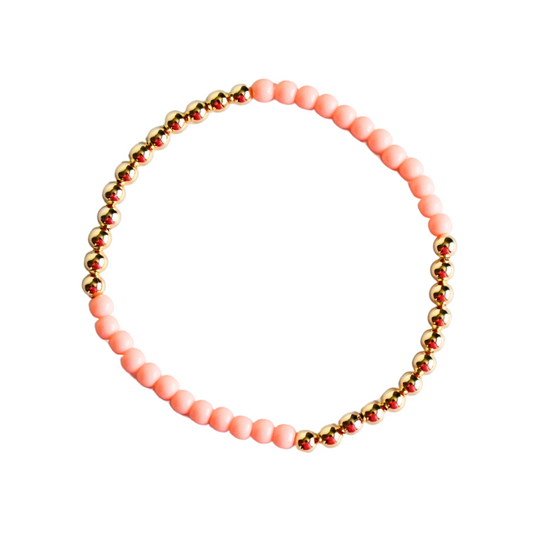 Dainty beaded bracelet featuring 4mm gold filled beads and 4mm orange glass beads