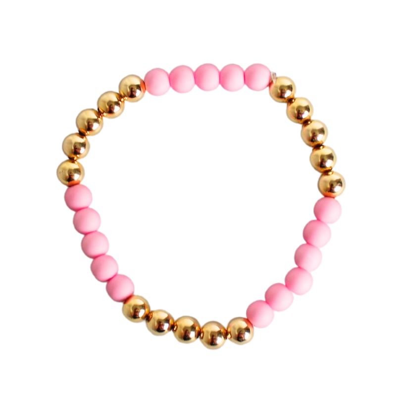 This sweet pink acrylic bracelet is the perfect summer accessory. The simplicity of this bracelet adds a girly touch to your look. Wear alone or add to any Elliot Lane bracelet for a soft touch of color. Acrylic gold filled round beads