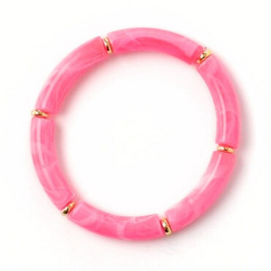 8mm pink marble acrylic tube bangle. Gold plated flat beads alternating after each acrylic tube. Chunky bangle style.