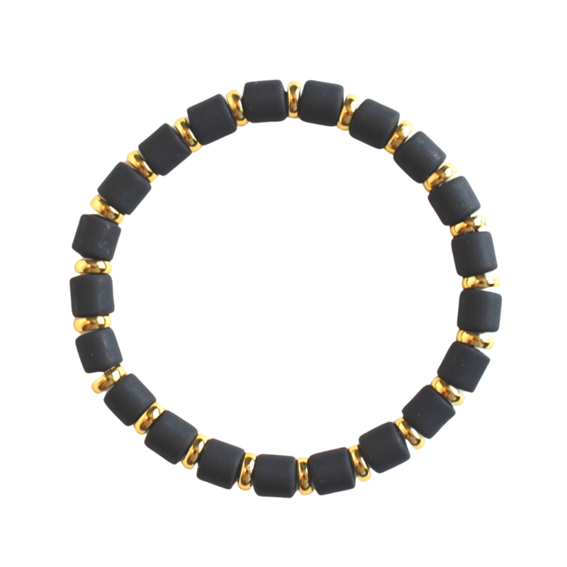 Single black beaded neutral stretch bracelet for layering and stacking. Curated with black wide polymer clay beads and gold-plated flat beads.