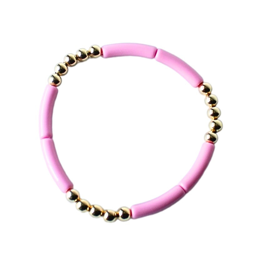 Pink skinny acrylic tube beaded bracelet with 18k gold-filled round beads.