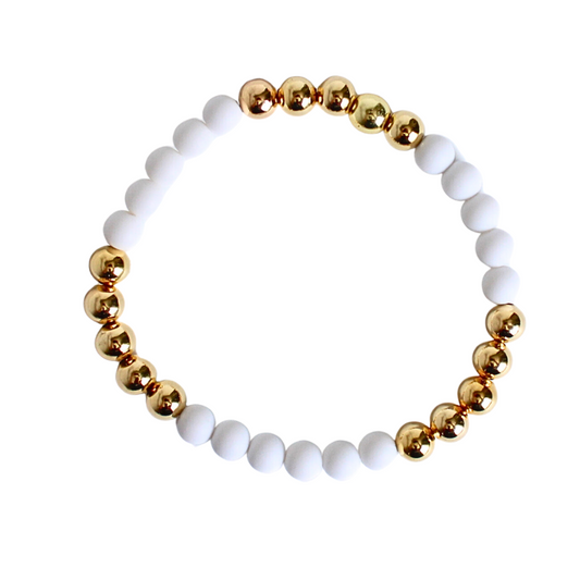 White acrylic 6mm round beaded stretch bracelet with 6mm 18k gold filled round beads.