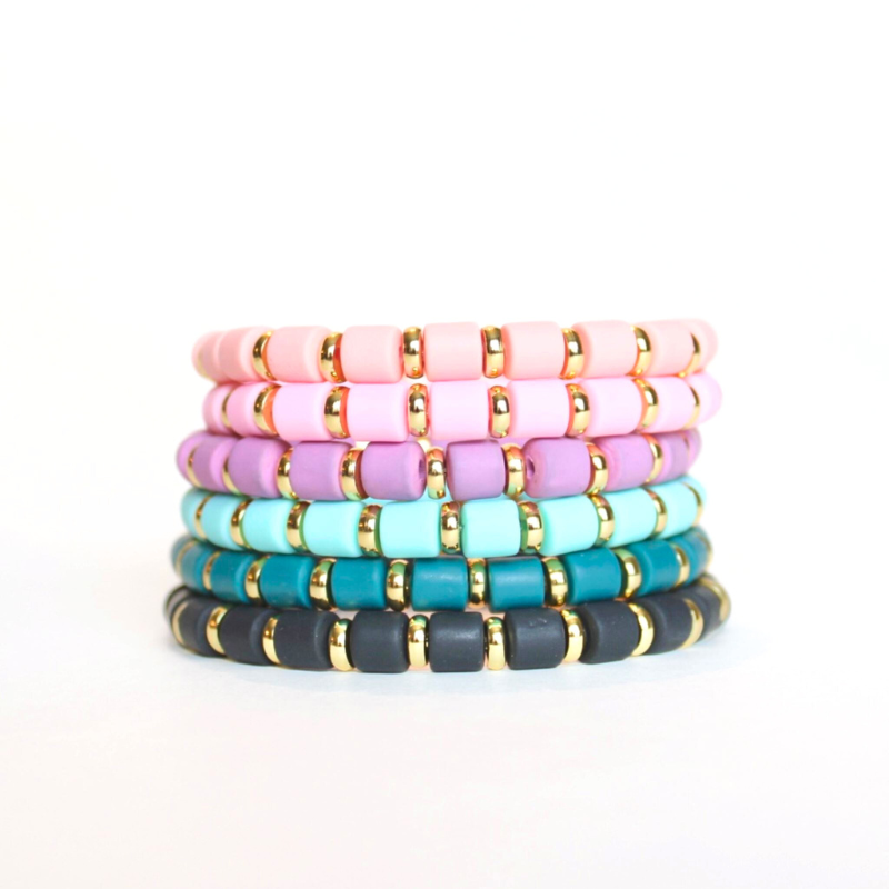 Stack of wide beaded acrylic beaded stretch bracelets.  These bracelets come in a variety of colors